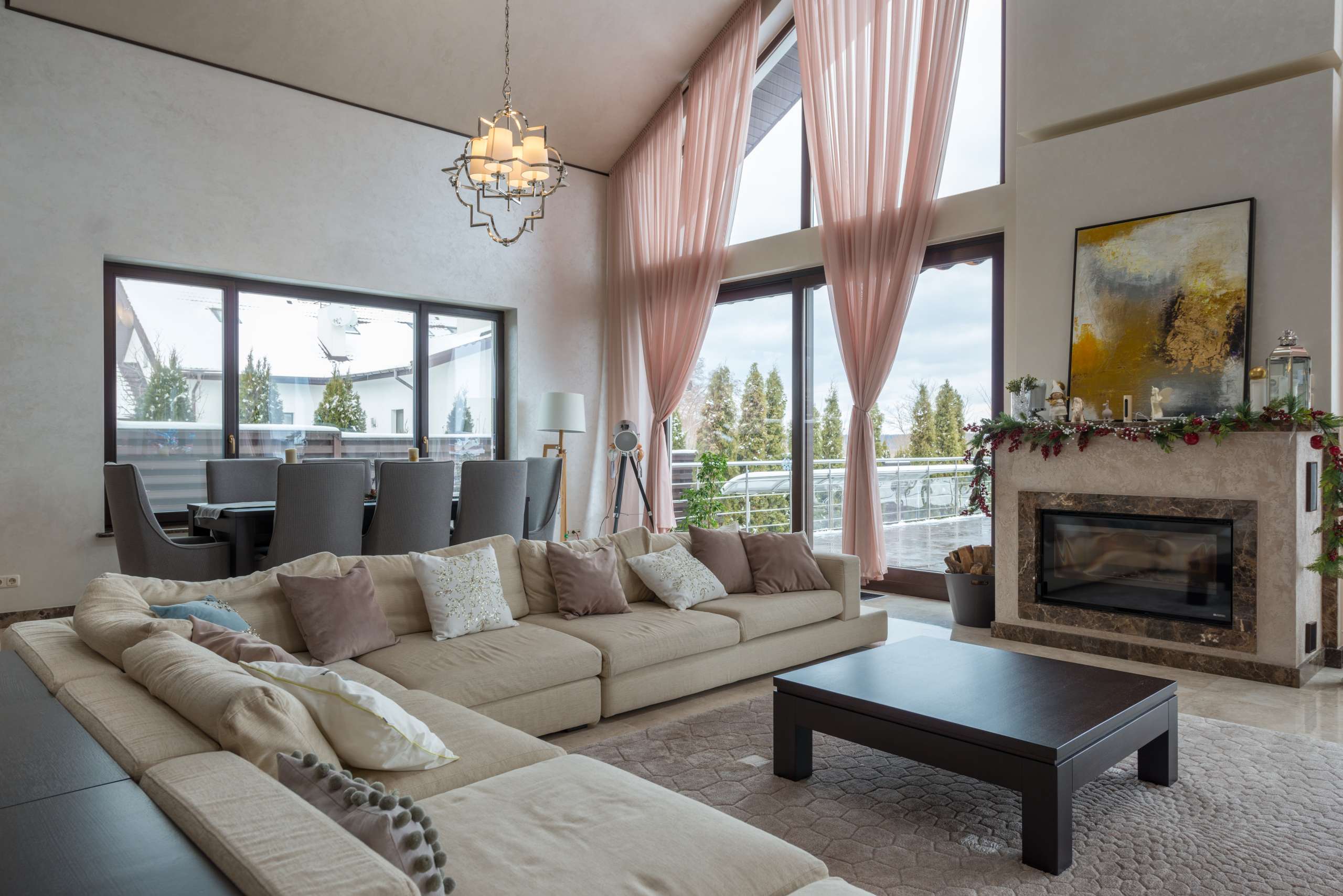 Vinyl picture Window with a casement window on either side, and a massive patio door.