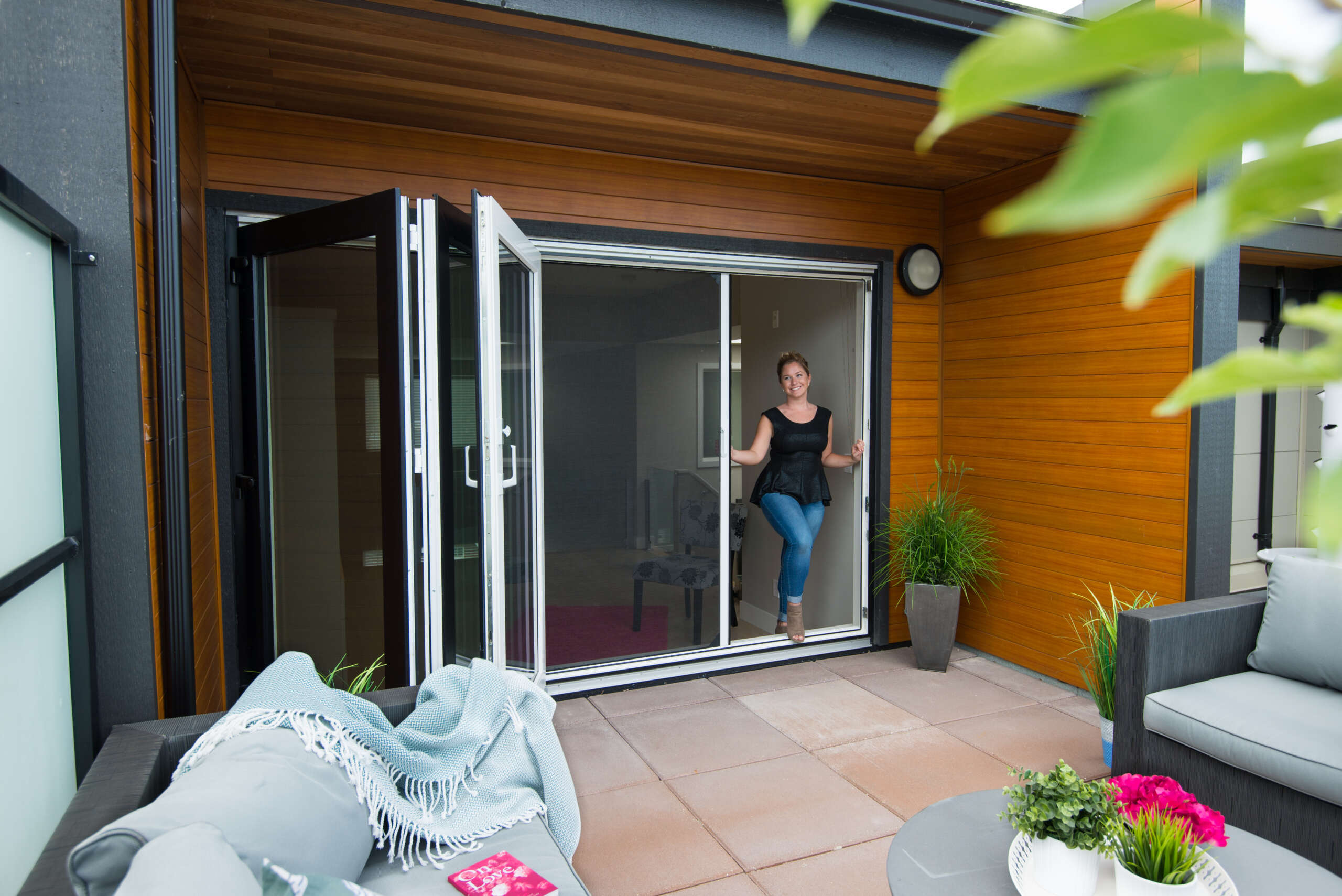 Phantom Screens for multi-panel doors. Simple design with a touch of tech. With the best materials, we've made a durable manually retracting screen for your large openings.