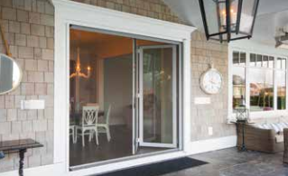 Manual Phantom Screens for Multi Panel Systems. Simple design with a touch of tech. With the best materials, we've made a durable retracting screen for your large multi-door openings.
